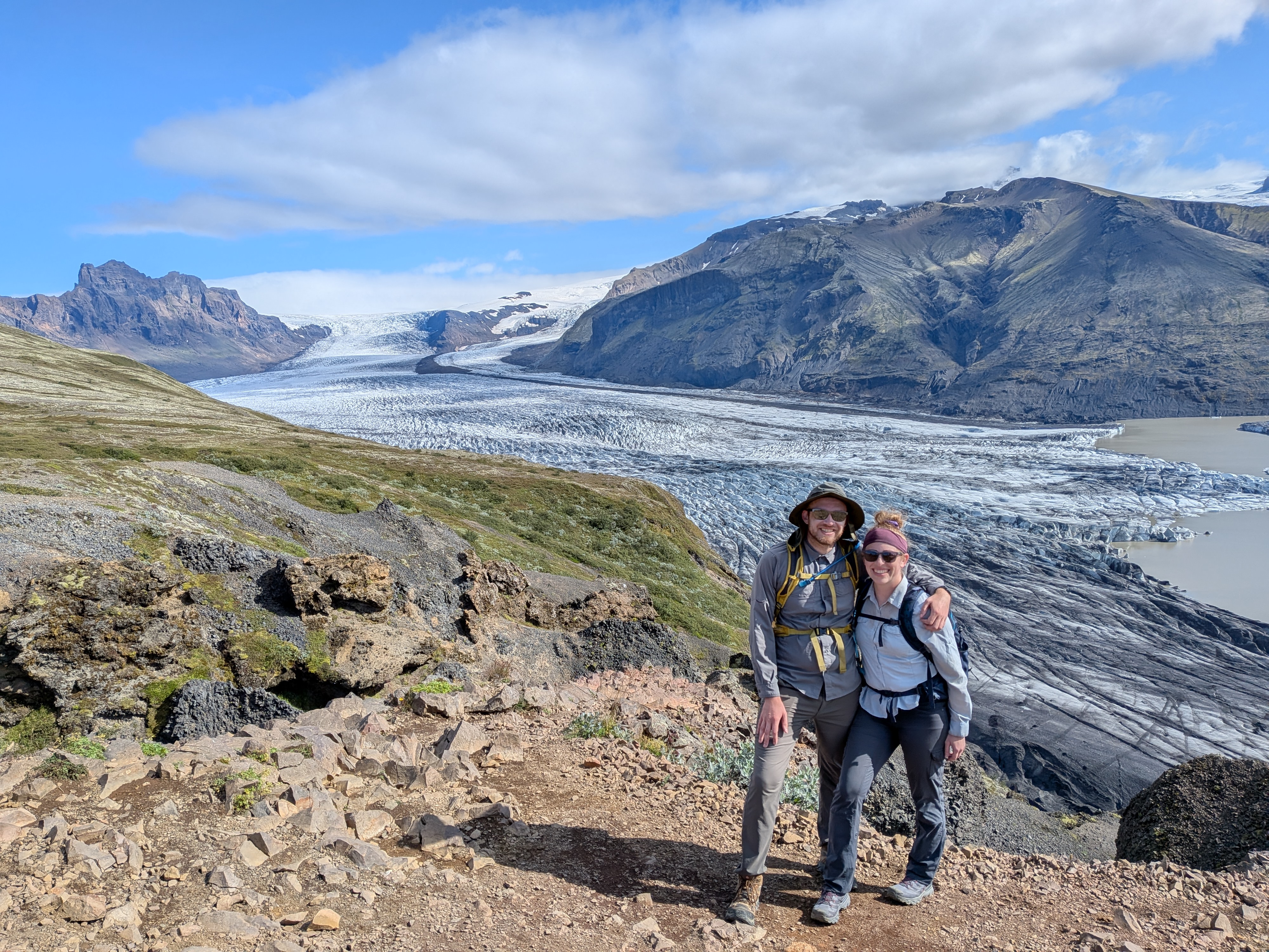 Stephanie and husband in front of a glacier in Iceland